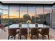 Modern dining room with glass table and scenic views at 4796 E Charles Dr, Paradise Valley, AZ 85253