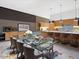 Open concept kitchen with dining area, island, and modern appliances at 4796 E Charles Dr, Paradise Valley, AZ 85253