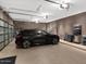 Finished garage with epoxy floor and ample storage at 4796 E Charles Dr, Paradise Valley, AZ 85253