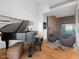 Relaxing music room with grand piano and comfortable seating at 4796 E Charles Dr, Paradise Valley, AZ 85253