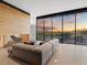 Living room boasts expansive windows showcasing scenic sunset views at 4796 E Charles Dr, Paradise Valley, AZ 85253