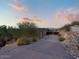 Modern home with long driveway leading to garage at 4796 E Charles Dr, Paradise Valley, AZ 85253
