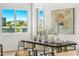 Modern dining area with city views and a large wooden table at 3131 N Central Ave # 3015, Phoenix, AZ 85012
