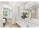 Modern bathroom with double vanity and large mirror at 3131 N Central Ave # 3015, Phoenix, AZ 85012