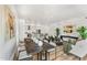 Modern dining area with large wood table and seating at 3131 N Central Ave # 3015, Phoenix, AZ 85012