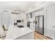 Modern kitchen with stainless steel appliances and an island at 3131 N Central Ave # 3015, Phoenix, AZ 85012