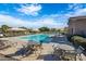 Relaxing community pool with plenty of seating at 42151 W Somerset Dr, Maricopa, AZ 85138