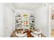 Bright home office featuring a glass desk and two chairs at 3131 N Central Ave # 3012, Phoenix, AZ 85012