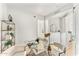 Modern home office with glass desk and stylish shelving at 3131 N Central Ave # 3012, Phoenix, AZ 85012