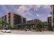 Modern apartment building with covered entryway and landscaping at 19355 N 73Rd Way # 2021, Scottsdale, AZ 85255
