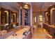 Luxurious bathroom with double vanities and a large mirror at 15 Biltmore Estates Dr, Phoenix, AZ 85016