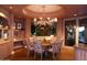 Charming breakfast nook with a round table and chairs, perfect for intimate meals at 15 Biltmore Estates Dr, Phoenix, AZ 85016
