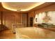 Gourmet kitchen boasts a large island, double ovens, and custom cabinetry at 15 Biltmore Estates Dr, Phoenix, AZ 85016