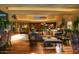 Bright and airy living room with hardwood floors and comfortable seating at 15 Biltmore Estates Dr, Phoenix, AZ 85016