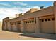 Attached four-car garage with stylish design at 15 Biltmore Estates Dr, Phoenix, AZ 85016