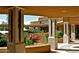 Landscaped courtyard with columns and flowers at 15 Biltmore Estates Dr, Phoenix, AZ 85016