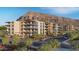 Contemporary apartment building nestled against a mountain backdrop at 4849 N Camelback Ridge Rd # B208, Scottsdale, AZ 85251
