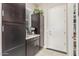 Well-organized pantry with ample shelving for storage at 42833 W Mallard Rd, Maricopa, AZ 85138