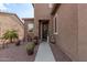 Inviting front entrance with landscaping, walkway, and charming seasonal decorations at 42833 W Mallard Rd, Maricopa, AZ 85138