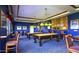 Community game room features two pool tables and a bar area at 42833 W Mallard Rd, Maricopa, AZ 85138