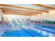 Resort-style indoor pool with multiple lap lanes at 42833 W Mallard Rd, Maricopa, AZ 85138