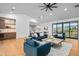 Relaxing living room with comfortable seating and a built-in bar at 38152 N 109Th St, Scottsdale, AZ 85262