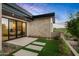Private patio with access to a bedroom and yard at 38152 N 109Th St, Scottsdale, AZ 85262
