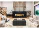 Modern living room with a stunning fireplace and open floor plan at 38152 N 109Th St, Scottsdale, AZ 85262