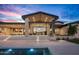 Back exterior showcasing the pool and landscaping at 38152 N 109Th St, Scottsdale, AZ 85262