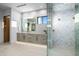Spa-like bathroom with a walk-in shower and modern vanity at 38152 N 109Th St, Scottsdale, AZ 85262