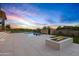 Expansive backyard oasis with a fire pit and pool at 38152 N 109Th St, Scottsdale, AZ 85262