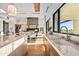 Modern kitchen with marble countertops and stainless steel appliances at 38152 N 109Th St, Scottsdale, AZ 85262