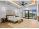 Spacious main bedroom with wood floors and sliding glass doors at 38152 N 109Th St, Scottsdale, AZ 85262