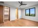 Bright bedroom with large windows, walk-in closet and ensuite bathroom at 38152 N 109Th St, Scottsdale, AZ 85262