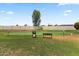 Community putting green with a bench at 3330 E Main St # 9, Mesa, AZ 85213