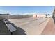 Community shuffleboard courts with benches for players at 3330 E Main St # 9, Mesa, AZ 85213