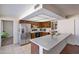 Kitchen with stainless steel appliances and wood cabinets at 4010 W Campo Bello Dr, Glendale, AZ 85308
