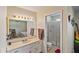 Clean bathroom with a shower, toilet and vanity at 4010 W Campo Bello Dr, Glendale, AZ 85308