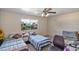 Spacious bedroom with two twin beds and ample natural light at 4010 W Campo Bello Dr, Glendale, AZ 85308