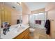 Bathroom with single sink vanity, shower/tub combo at 52019 N Forepaugh Peak Rd, Wickenburg, AZ 85390