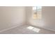 Well-lit bedroom with neutral walls and carpet flooring at 23942 N 171St Dr, Surprise, AZ 85387