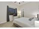 Bedroom with queen-size bed, TV, and ensuite bathroom access at 6990 E Buckhorn Trl, Scottsdale, AZ 85266