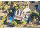 House with pool, basketball court, and lush landscaping at 6990 E Buckhorn Trl, Scottsdale, AZ 85266