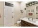 Small bathroom with toilet, vanity with dark wood cabinets, and white countertop at 6990 E Buckhorn Trl, Scottsdale, AZ 85266