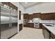 Modern kitchen boasts stainless steel appliances and ample counter space at 6990 E Buckhorn Trl, Scottsdale, AZ 85266