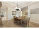 Formal dining room with hardwood floors and chandelier at 6990 E Buckhorn Trl, Scottsdale, AZ 85266