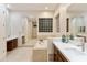 Spacious bathroom with soaking tub, double vanity, and large mirror at 6990 E Buckhorn Trl, Scottsdale, AZ 85266