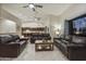 Spacious living room with comfortable seating and views to the kitchen at 6990 E Buckhorn Trl, Scottsdale, AZ 85266