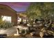 Landscaped front yard with desert plants and pathway lighting at 6990 E Buckhorn Trl, Scottsdale, AZ 85266