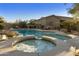 Inviting pool and spa with lounge chairs in the backyard at 6990 E Buckhorn Trl, Scottsdale, AZ 85266